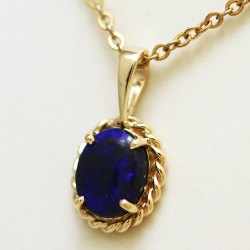 14k Yellow Gold Pendant with a SOLID BLACK OPAL Floral Harlequin pattern, sparkling and bright